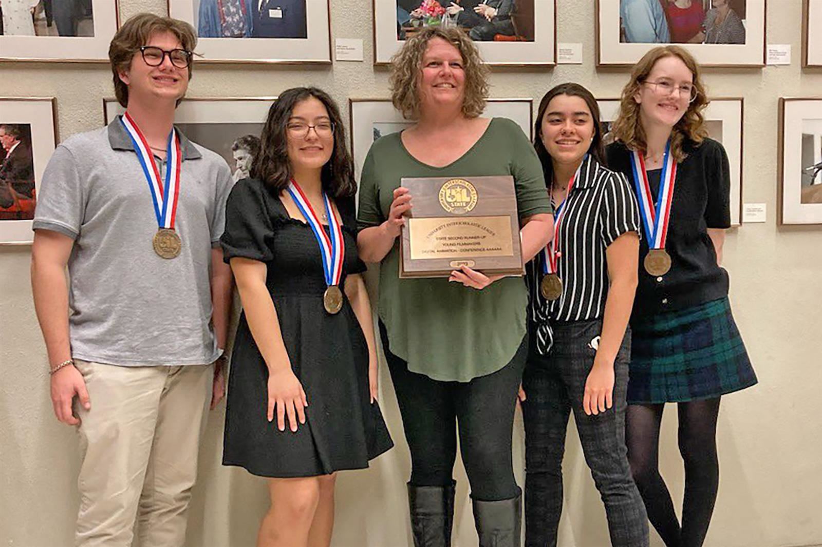 Cypress Woods High School seniors, from left, Cameron Wallace, Abby Hernandez, Nicole Guzman and Elise Marosek placed third.